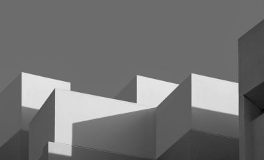 Güneş ışığı ve Gölge ile modern bina beton duvar yüzeyi Perspektif düşük açılı görünüm, Geometrik mimari arka plan Siyah ve Beyaz tarzlı minimal