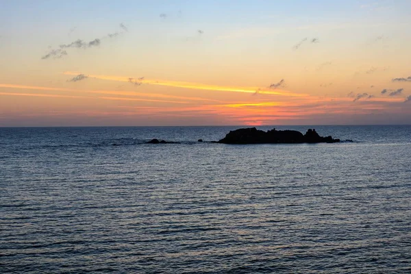 stock image sunset over the sea off the coast of sardinia