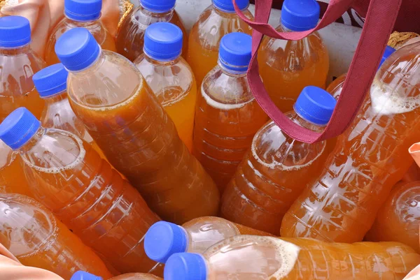 Fresh honey packed in the plastic bottle