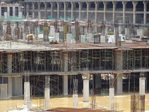 stock image KUALA LUMPUR, MALAYSIA -AUGUST 26, 2017: Concrete column under construction with protruded steel reinforcement bar at the top. Ready to continue casting for the next level.