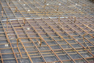 SELANGOR, MALAYSIA -MAY 13, 2016: Hot rolled deformed steel bars or steel reinforcement bar used at construction site to strengthen concrete. It is shaped follow the engineer design.