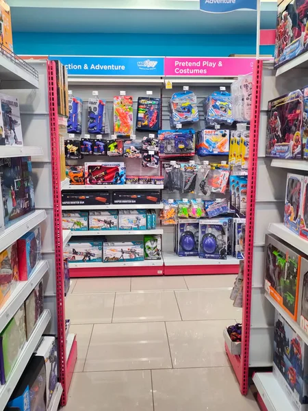 stock image JOHOR, MALAYSIA -JULY 24, 2022: Children's toys are hung and displayed for sale. Toys are made in colorful colors and various designs to attract children's interest. Has a price tag.