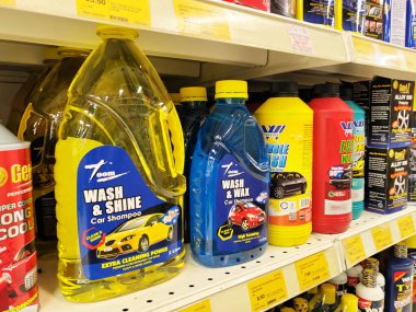 JOHOR, MALAYSIA -FEBRUARY 3, 2022: Various car care products on display for sale. Separated by category, brand, type and price. Have a price tag to make it easier for customers.