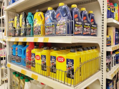 JOHOR, MALAYSIA -FEBRUARY 3, 2022: Various car care products on display for sale. Separated by category, brand, type and price. Have a price tag to make it easier for customers.