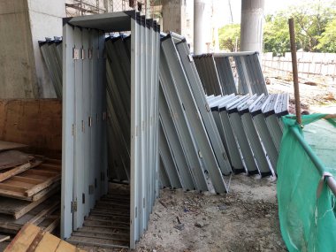 KUALA LUMPUR, MALAYSIA -MARCH 5, 2020: Mild Steel Door Frame at the construction site. Install by construction workers. More quality and durable compare to the wooden door frame. 