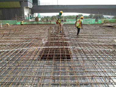 SHAH ALAM, MALAYSIA -APRIL 14, 2016: Floor slab reinforcement bar on timber form work at the construction slab in Sepang, Selangor, Malaysia