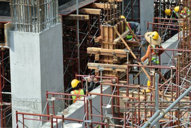 PERAK, MALAYSIA -APRIL 10, 2016: Column form works installed by construction workers at site in Perak, Malaysia.  