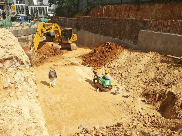 stock image SELANGOR, MALAYSIA - JULY 23, 2022: Retaining wall is under construction. The retaining wall was built according to the engineer's design. The site is excavated to build the foundation structure