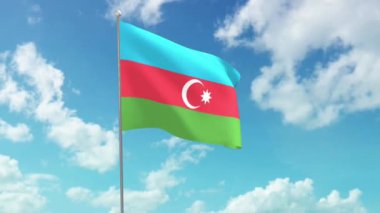 Aserbaijan 'ın ulusal bayrağı, mavi gökyüzünde dalgalanıyor..