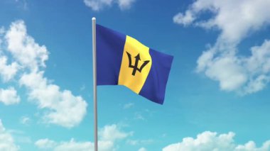 Barbados 'un ulusal bayrağı, mavi gökyüzünde dalgalanıyor.