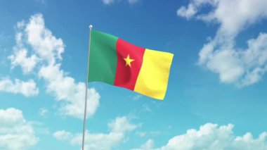 Kamerun 'un ulusal bayrağı, mavi gökyüzünde dalgalanıyor..