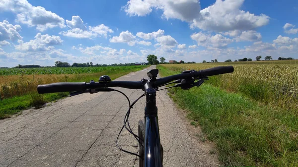 Stock image Gravel bicycle ride on the road in the summer season