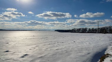 Scenery landscape background with the field in the winter season