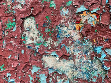 old cracked paint on wall background in grunge style
