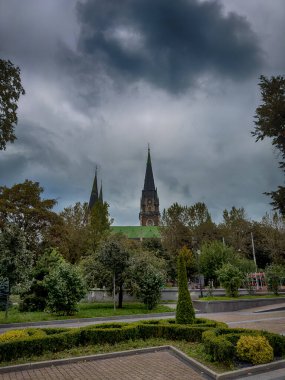Neo Gothic Polish cathedral Olga and Elizabeth in Lviv city spires under dramatic skies