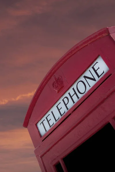 Telephone box in London at dusk