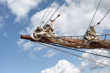 Bow and sail of an old sailing ship clipart