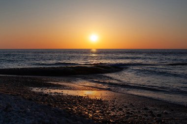 Atlantik sahilinde gün batımında