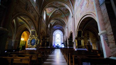 Altar and benches in an old 12th-century church in Poland. High quality photo