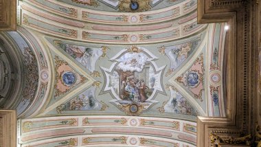 The interior of an old 12th-century church is painted with frescoes, Poland. High quality photo