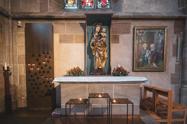 Statues of saints and icons in the ancient Coatolic Gothic Cathedral of Nuremberg, Germany. High quality photo
