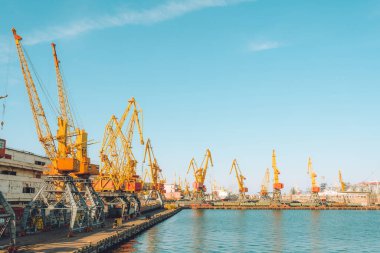 Container cargo ship at industial port in import export logistic and transportation of international by container cargo ship in the open sea. Odessa, Ukraine
