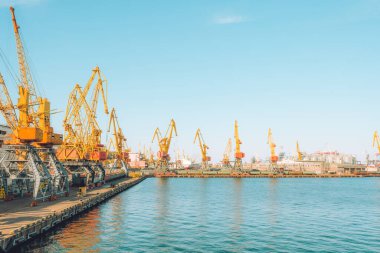 Container cargo ship at industial port in import export logistic and transportation of international by container cargo ship in the open sea. Odessa, Ukraine