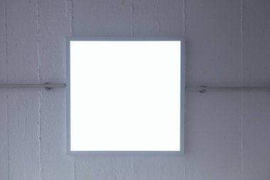 LED ceiling light mounted in an industrial space