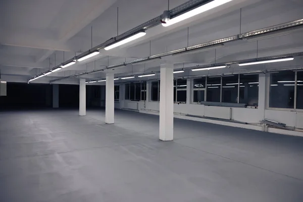 Production hall equipped with new epoxy flooring and LED lamps