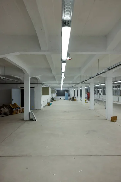 An interior of a modern factory, industrial building, factory interior design