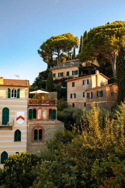 the authentic scene of the beautiful fishing village of Portofino, a top destination in Italy