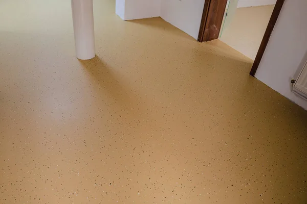A medical facility with new decorative epoxy flooring. Colorful chips embedded in the seamless surface create a vibrant and durable solution.Selective focus
