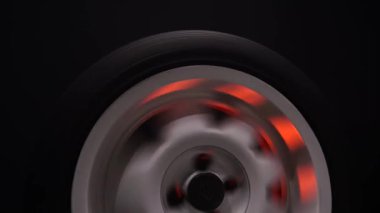 spinning car wheels white shooting video on long exposure motion effect