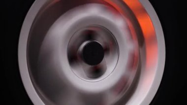 spinning car wheels white shooting video on long exposure motion effect
