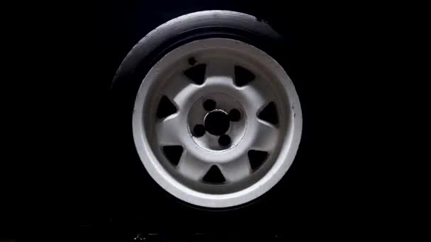 Spinning Car Wheels White Shooting Video Long Exposure Motion Effect — Vídeo de Stock