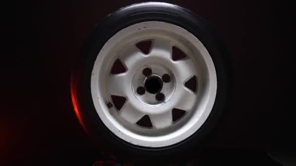 Spinning Car Wheels White Shooting Video Long Exposure Motion Effect — стоковое видео