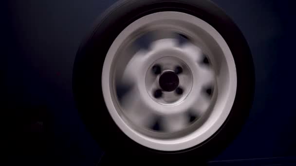 Spinning Car Wheels White Shooting Video Long Exposure Motion Effect — стоковое видео