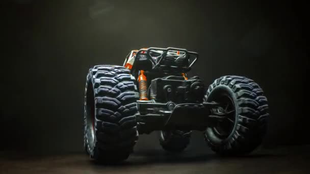 Orange Road Toy Car Turns Big Tires Art Creative Rendering — Video Stock