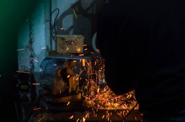  long exposure photo car repair, installation of rear disc brakes instead of drums, welding, locksmith and turning works