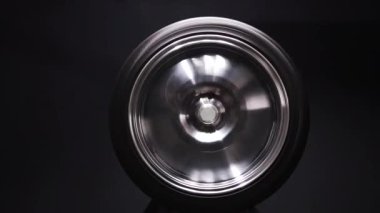 new chrome rims, car wheels for a drift car, custom tuning, long exposure video, motion blur effect