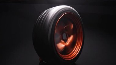 orange metal welded rims car wheels for a drift car custom tuning long exposure video motion blur effect