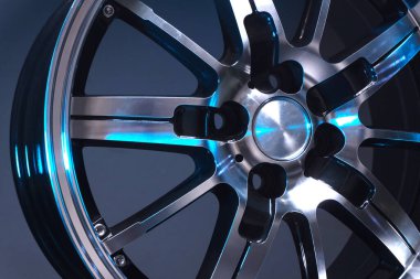 old car wheels titanium rims long exposure video on dark background spinning motion simulation