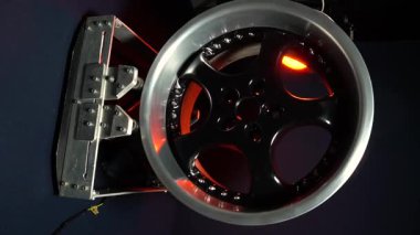 old car wheels titanium rims long exposure video on dark background spinning motion simulation