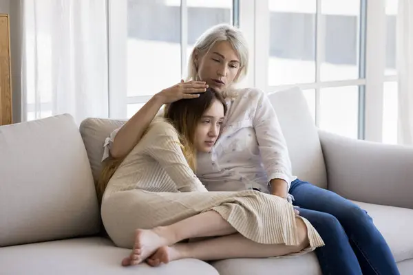 Loving Mum Stroking Her Frustrated Pre Teen Daughter Give Emotional — Stock Photo, Image