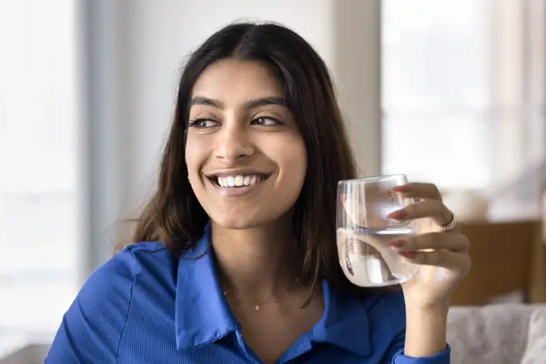 Cheerful Beautiful Young Indian Woman Promoting Healthy Aqua Balance Holding — Stock Photo, Image