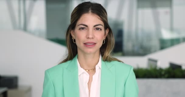 Latina Businesswoman Elegant Jacket Posing Modern Workplace Smile Staring Cam — Stock Video