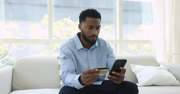 Young African Man Feels Frustrated Annoyed Experiences Unsuccessful Internet Transaction — Stock Video