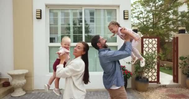 Loving Parents Play Throwing Little Kids Air Engaged Joyful Playful — Stock Video