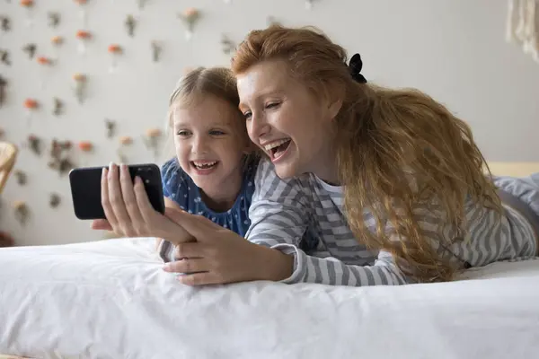Happy Mom Little Daughter Spend Time Home Lying Bed Use Stock Image