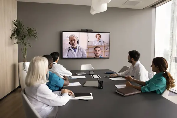 Clinic Staff Meeting Boardroom Talking Remote Medical Colleagues Online Video Stock-foto